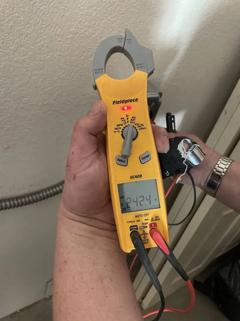 Voltage testing with clamp meter during Generator Installation in Danvers